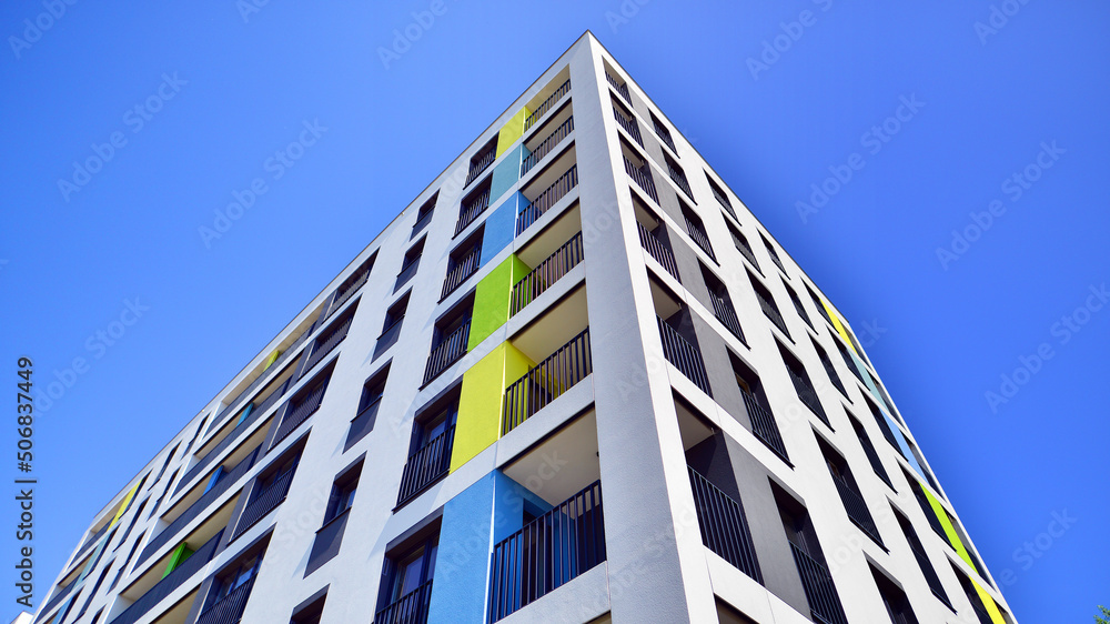 Apartment residential house and home facade architecture and outdoor facilities. Blue sky on the bac