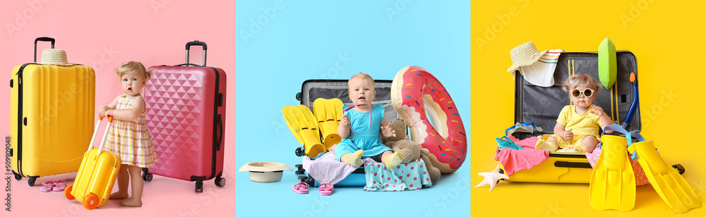 Cute baby girls and suitcases with travelers accessories on colorful background