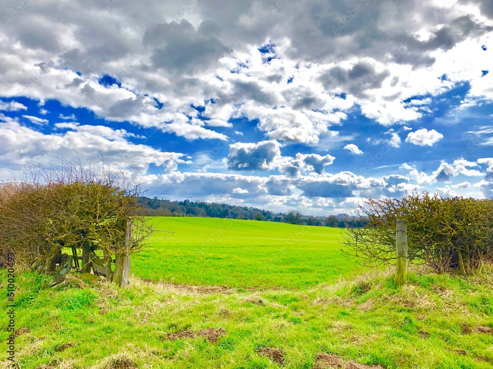 landscape with sky and clouds in english countryside