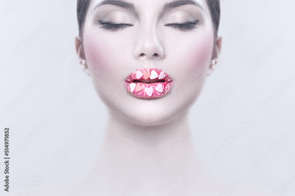 Valentine Hearts sweet makeup. Valentines Day make-up lips with pink hearts sugar sprinkles. Kiss o