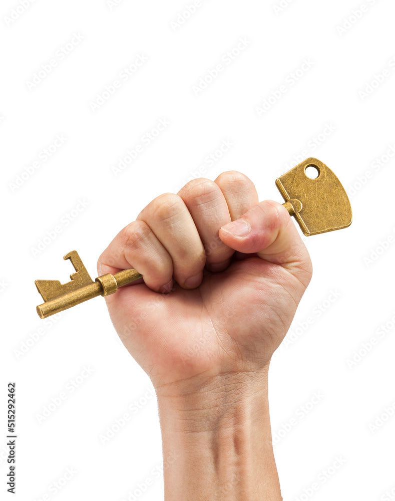一只手拿着白色的钥匙。成功的关键。