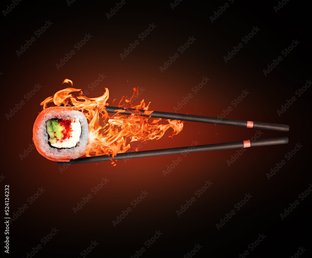 寿司卷，三文鱼夹在带火的棍子之间