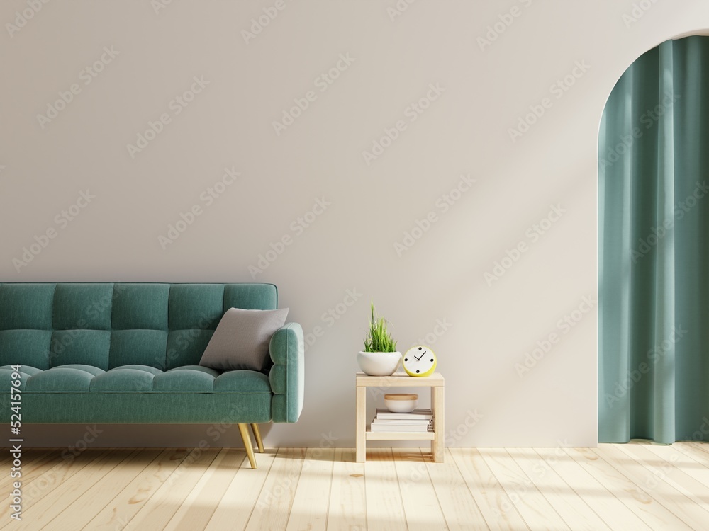客厅，空荡荡的白墙背景上有绿色沙发。