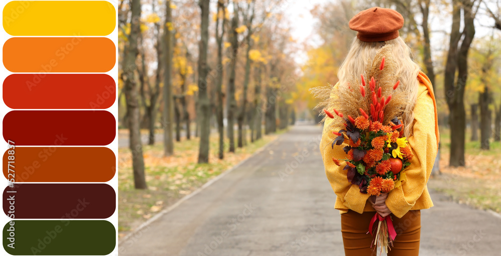公园里，一位年轻女子背着美丽的秋季花束。不同的颜色图案