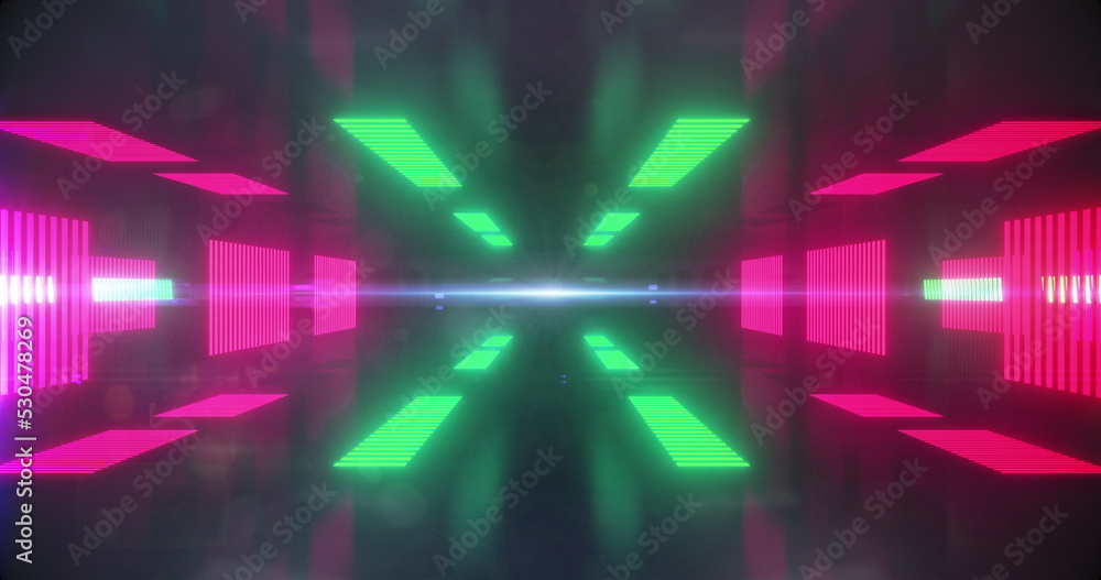 Image of glowing shapes moving against black background