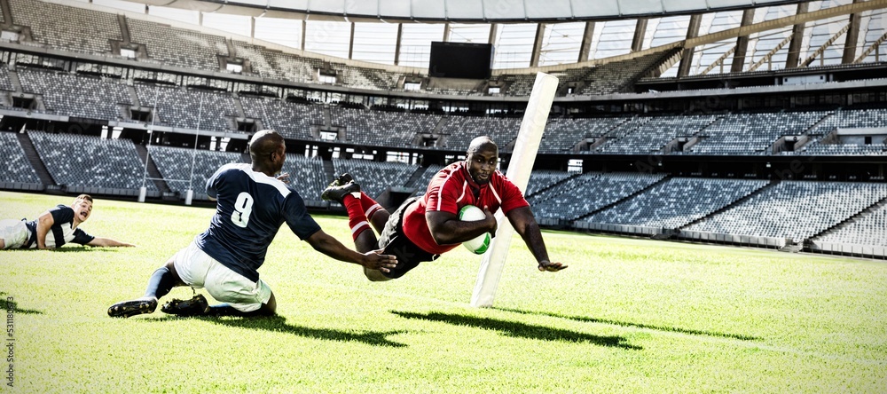 橄榄球运动员在体育场带球跳跃触地得分的数字合成图像