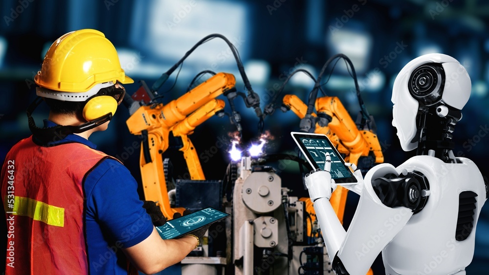 Cyberized工业机器人和人类工人在未来工厂合作。人工概念