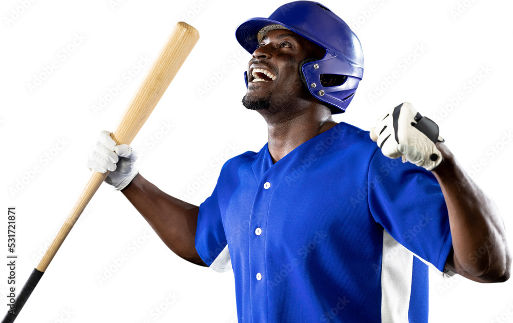 欢呼的非裔美国男子棒球运动员戴着头盔拿着球棒的照片