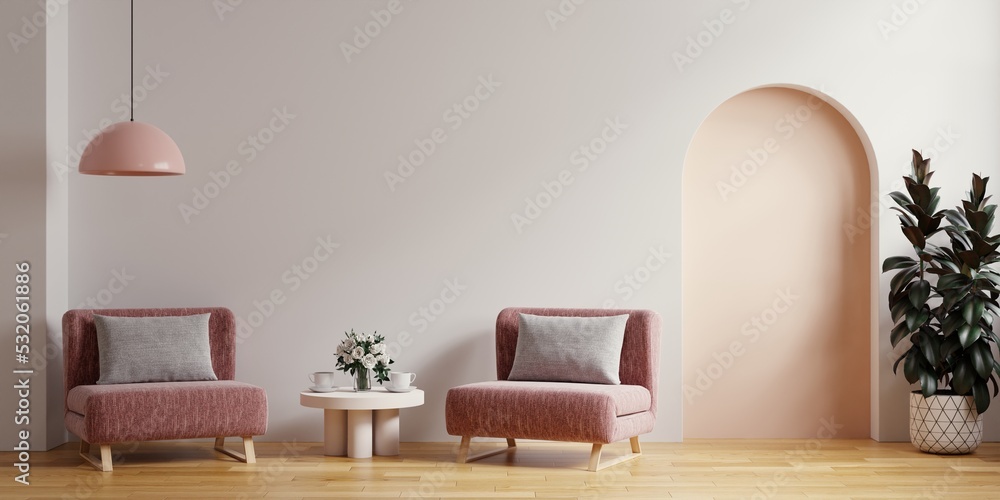 斯堪的纳维亚客厅，白色空墙背景上有两把粉色扶手椅。