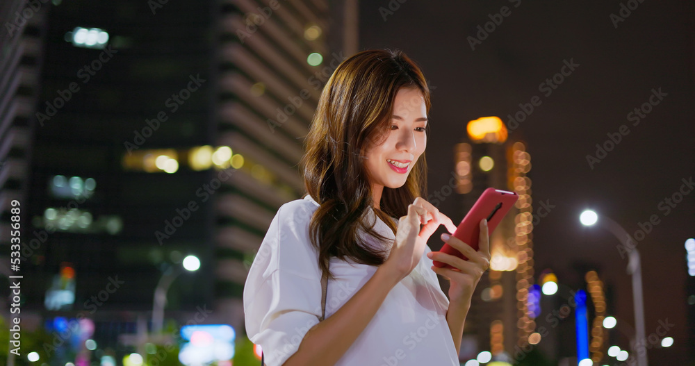 businesswoman use phone outdoor