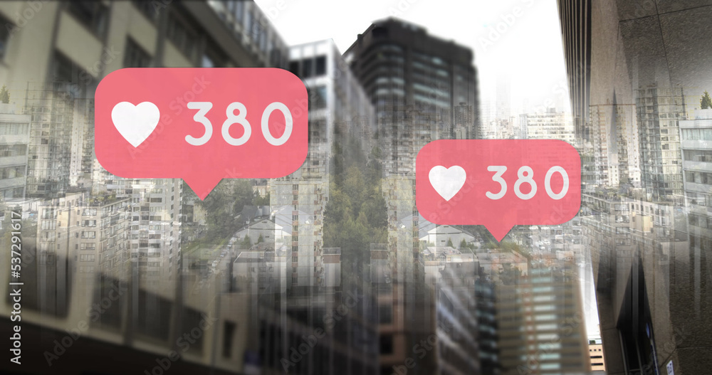 Image of social media reactions over cityscape