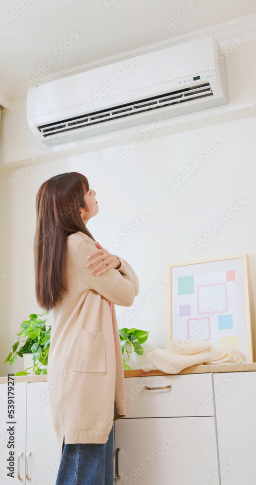 woman use heating at home