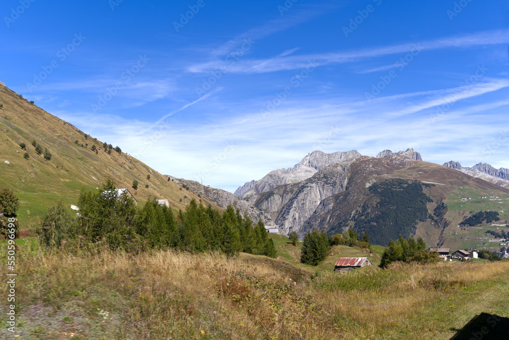 Scenic landscape at Swiss mountain valley Urserntal, Canton Uri, in the Swiss Alps on a sunny late s