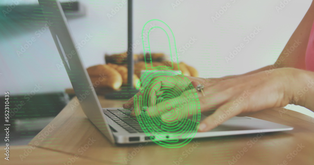 Image of biometric fingerprint padlock, data processing over woman using laptop