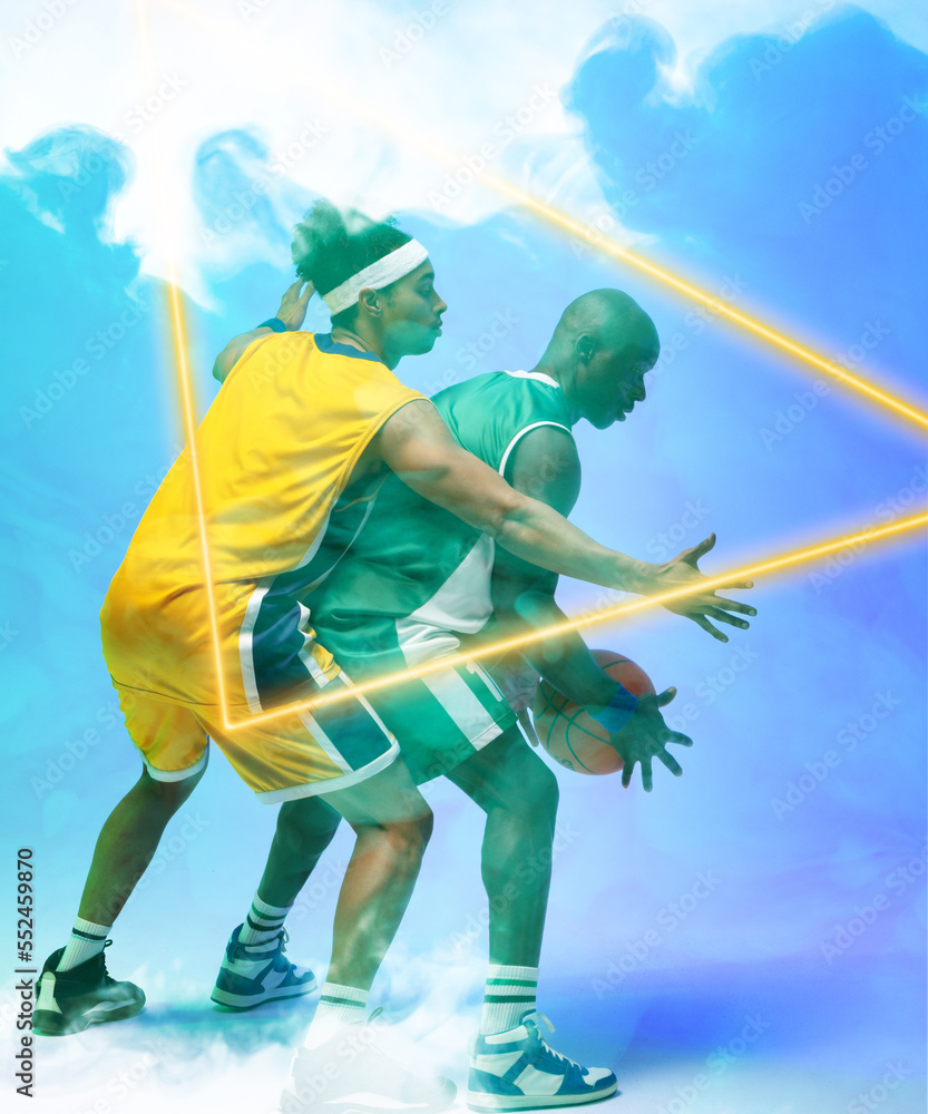 African american basketball players dribbling ball by illuminated triangle on blue smoky background