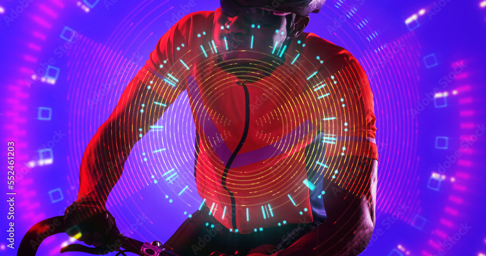 Illuminated square and lines in circular patterns over african american male athlete riding bike