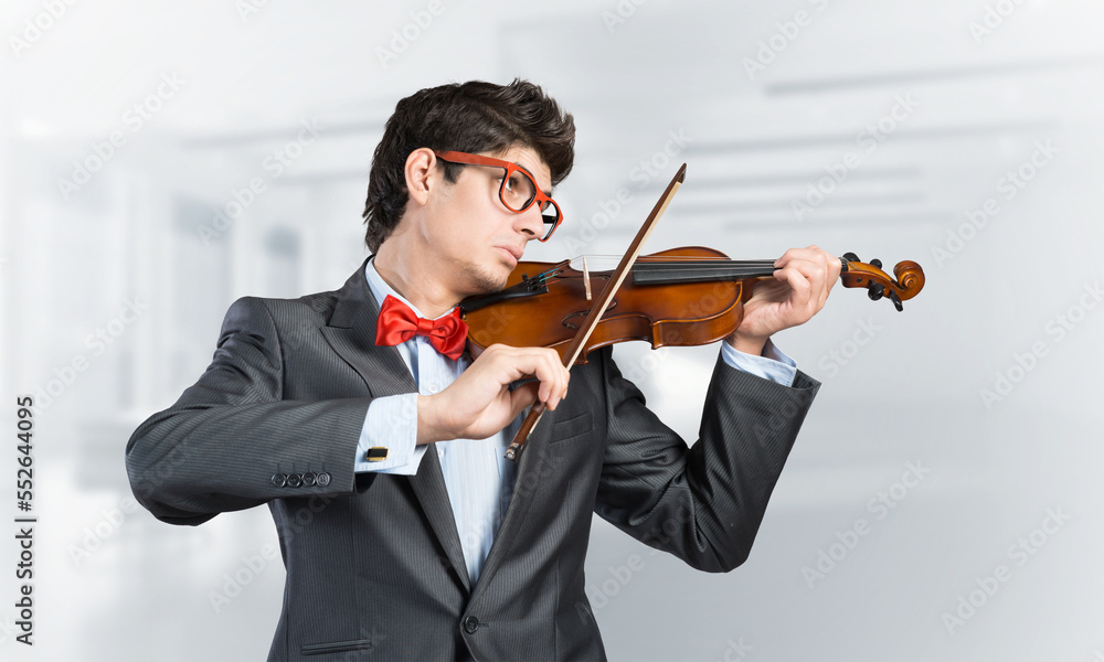young musician plays the violin