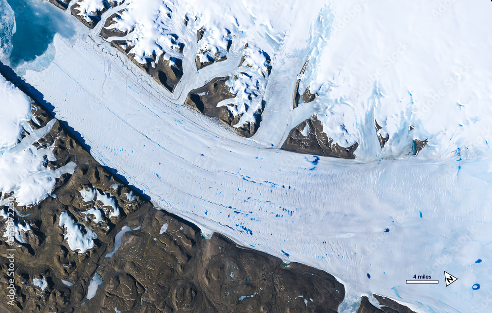 Aerial view of meltwater lakes forming on the surface of Greenland’s Petermann Glacier. Digitally en