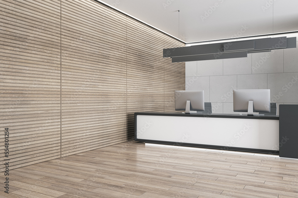 Luxury wooden and concrete office reception interior with desk and computer monitors. Hotel lobby an