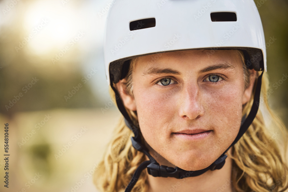 Mountain biking, fitness and portrait of a man with a helmet in nature for safety, sports exercise a