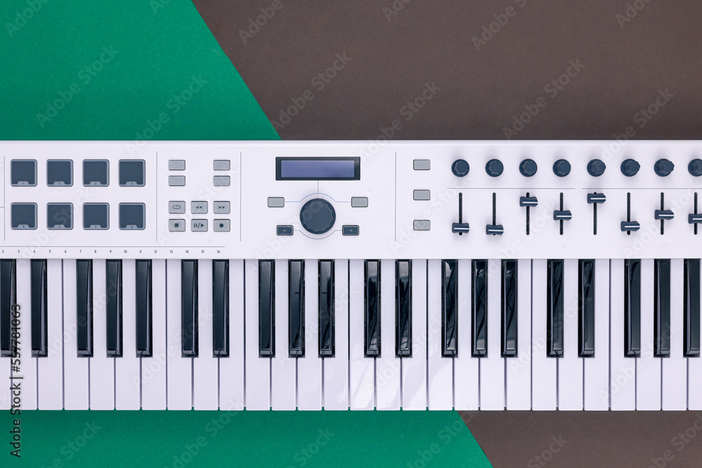 Music keys on a colored background, flat lay.