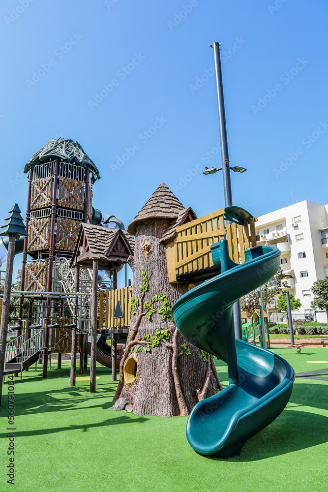 View of childrens complex with slide on playground