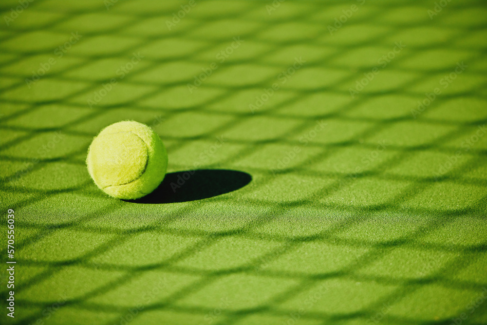 Tennis ball, court shadow and green texture of grass turf game with no people. Sports, empty sport t