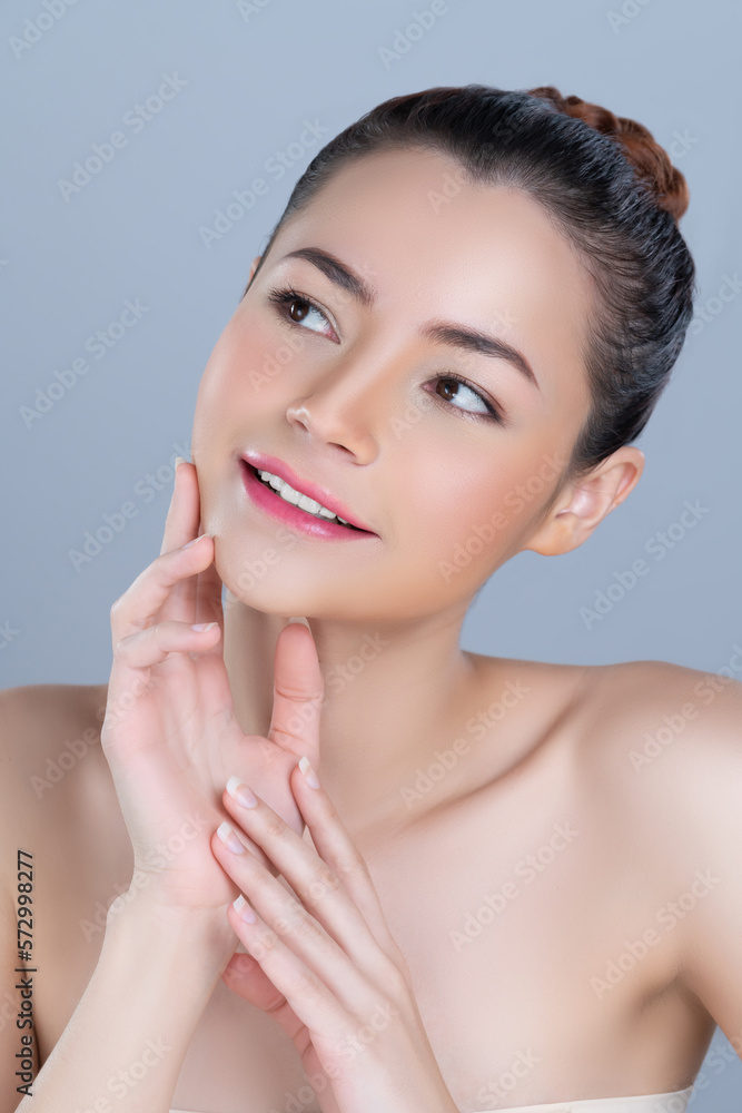 Glamorous woman portrait with perfect smooth pure clean skin with soft cosmetic makeup in isolated b