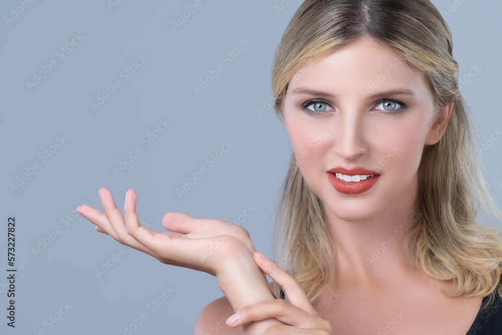 Beautiful blonde hair woman posing alluring hand gesture indicate product on isolated background cop