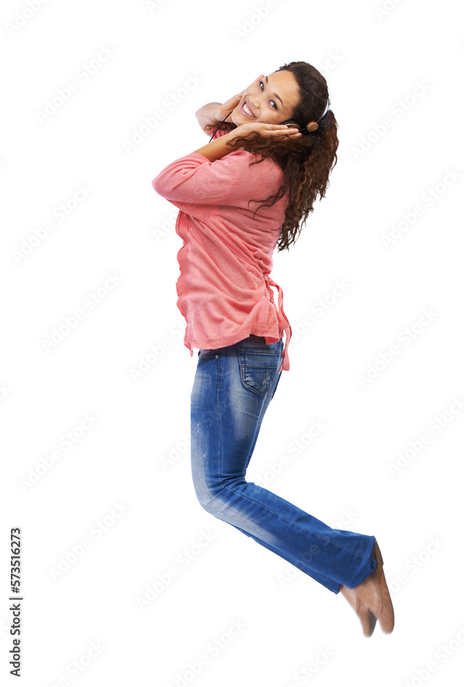 A millennial trendy girl in casual outfit, jumping high with excitement on getting a free or a stude