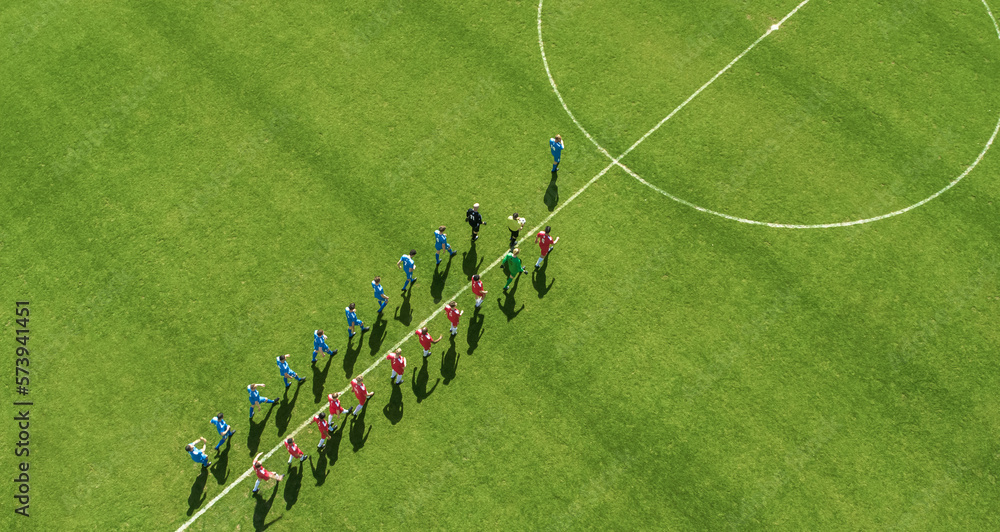 Aerial Top View Shot of Soccer Championship Match Beginning. Two Professional Football Teams Enter S