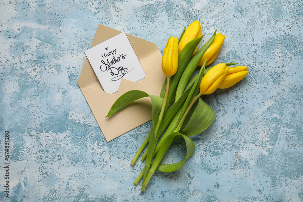 Card with text HAPPY MOTHERS DAY, envelope and beautiful tulip flowers on color background