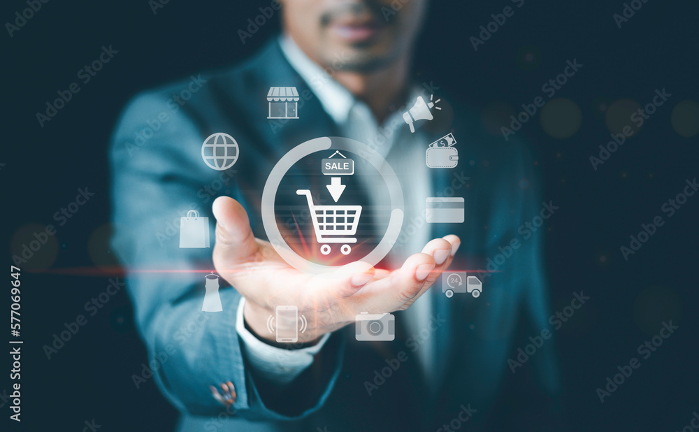 Man hand holding shopping cart and business icons, Technology online shopping business concept, busi