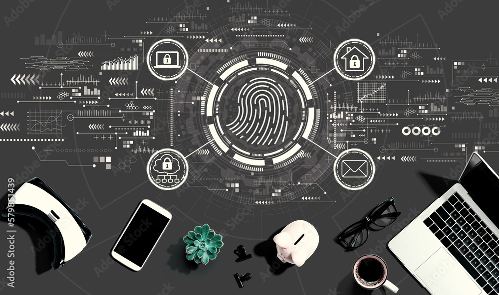 Fingerprint scanning theme with electronic gadgets and office supplies - flat lay