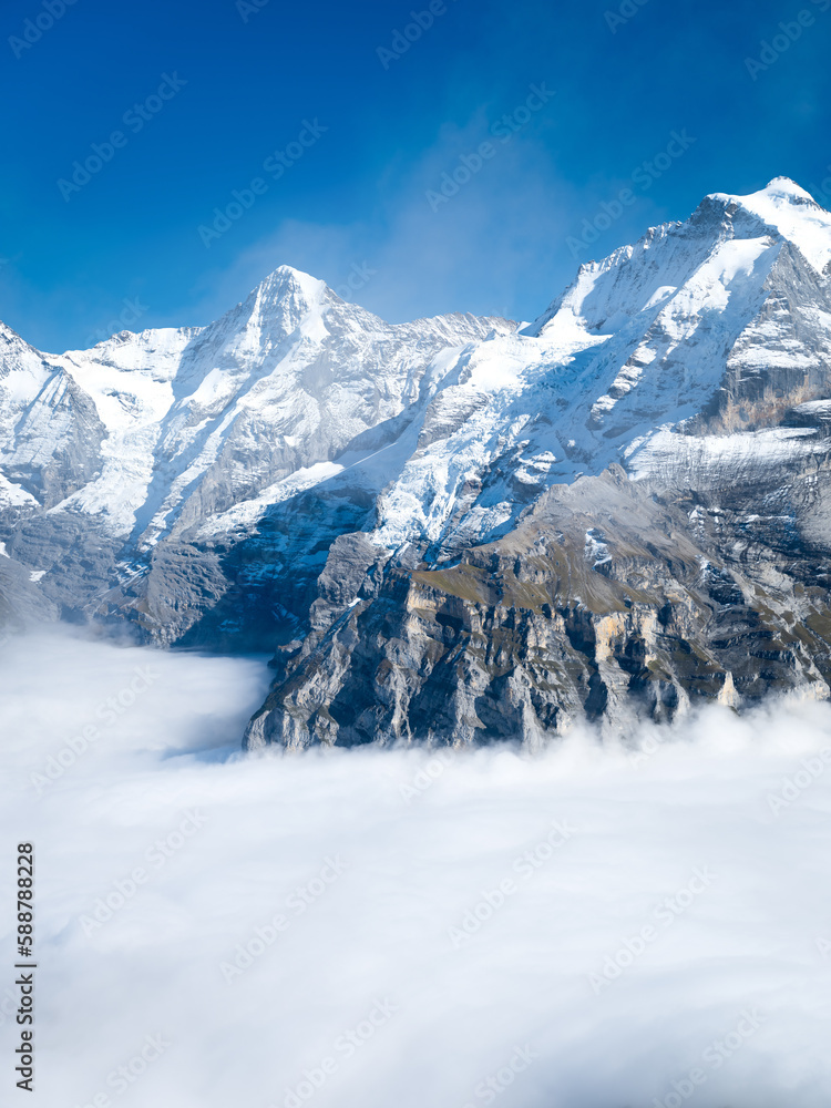 Mountain scenery in the Swiss Alps. Mountains peaks. Natural landscape. Mountain range and clear blu