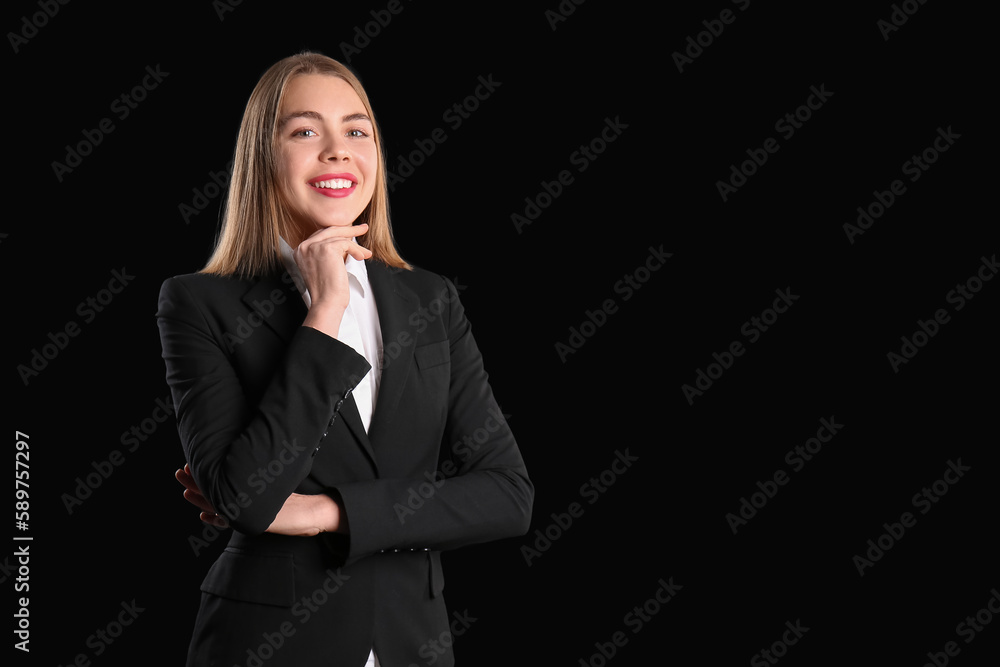 Female business consultant on black background