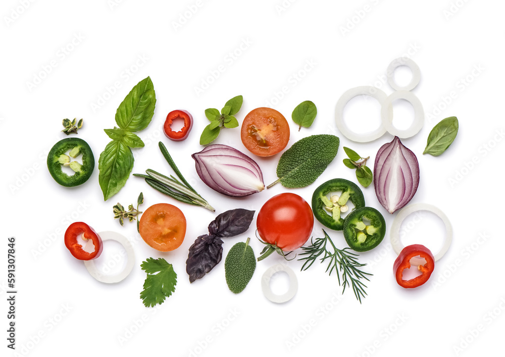 Composition with fresh herbs and vegetables isolated on white background