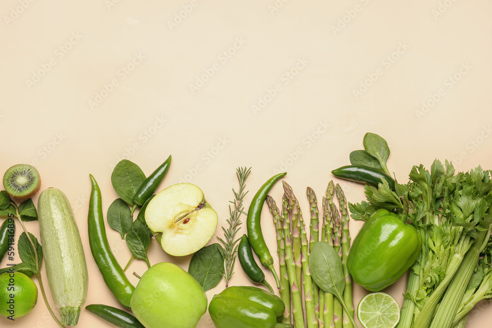 Composition with different fresh vegetables and fruits on beige background
