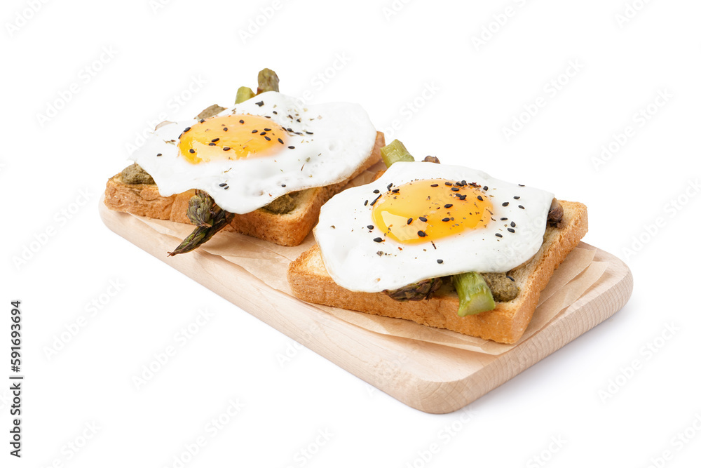 Delicious sandwiches with fried eggs and asparagus on white background