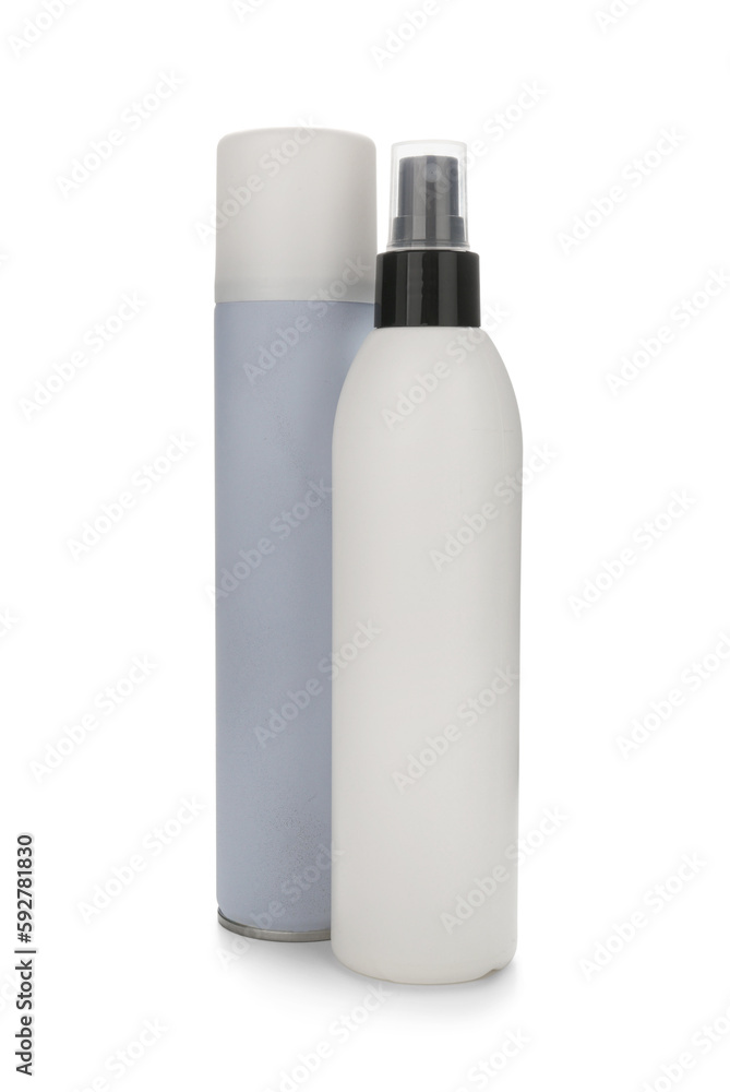 Bottles of hair sprays on white background