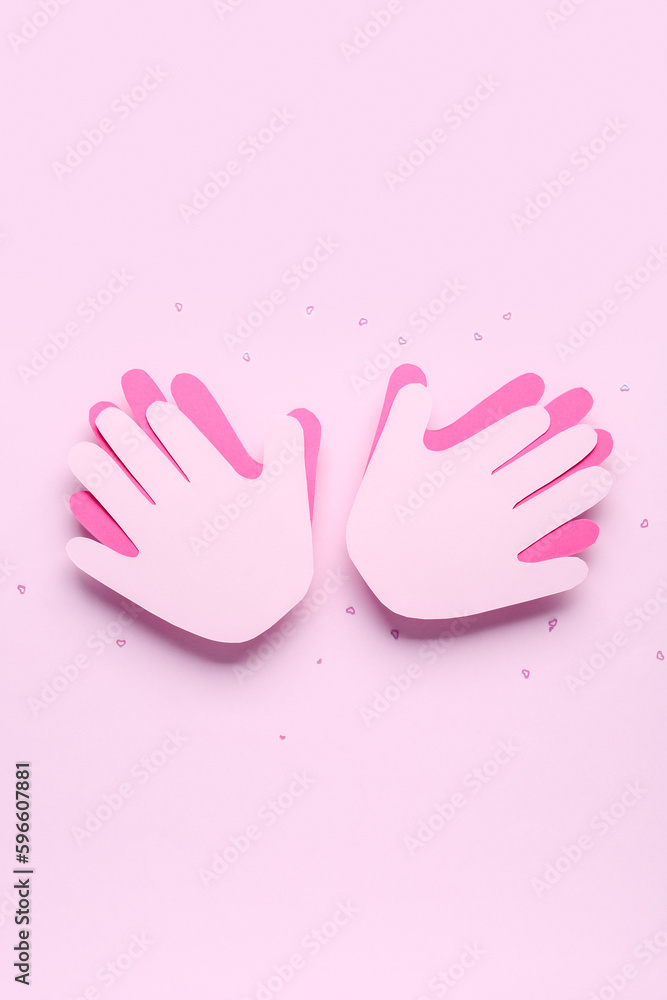 Paper palms for Friendship Day on pink background