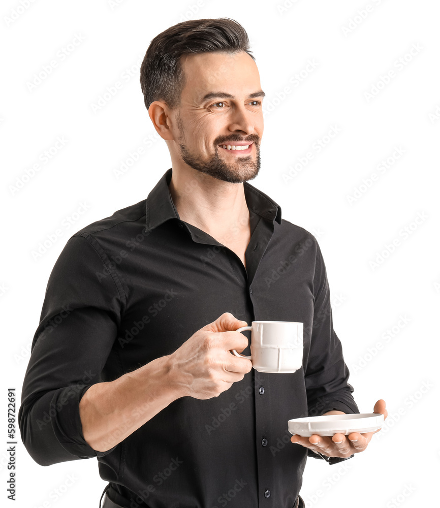 Handsome businessman with cup of coffee on white background