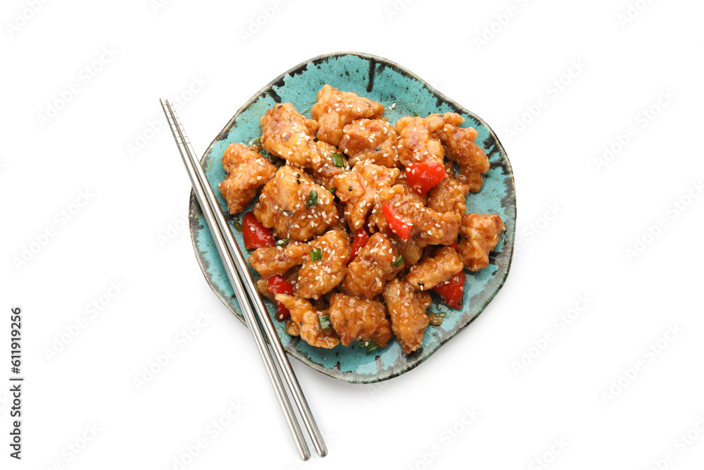 Plate with tasty sweet and sour chicken on white background