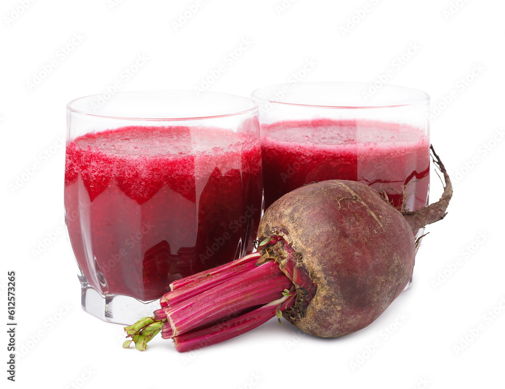 Glasses of healthy beet juice on white background