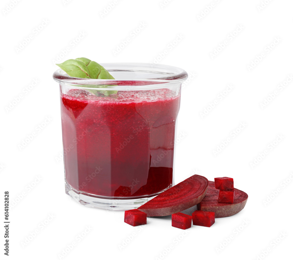 Glass of healthy beet juice and spinach on white background