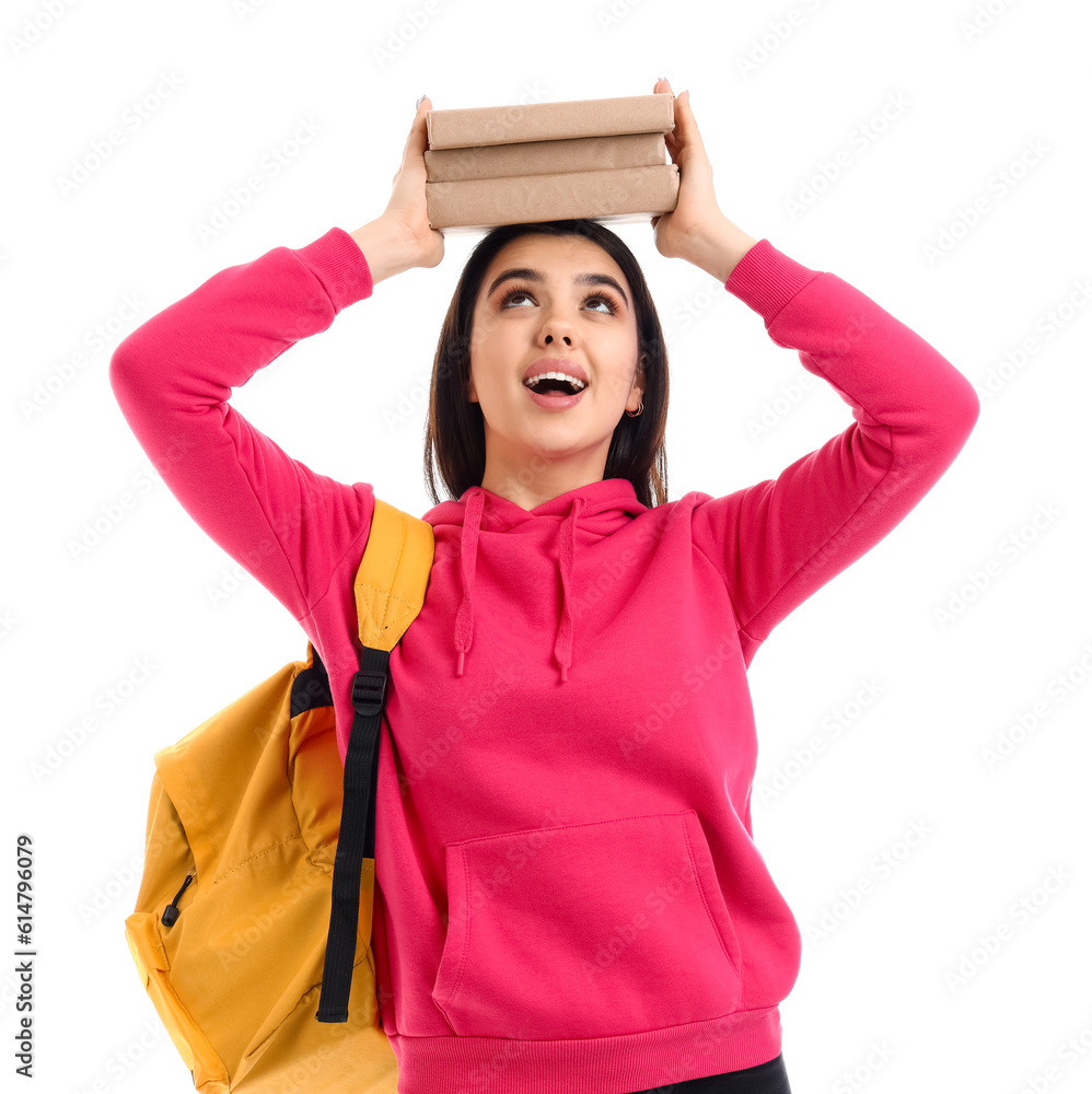 Portrait of female student with books on white background