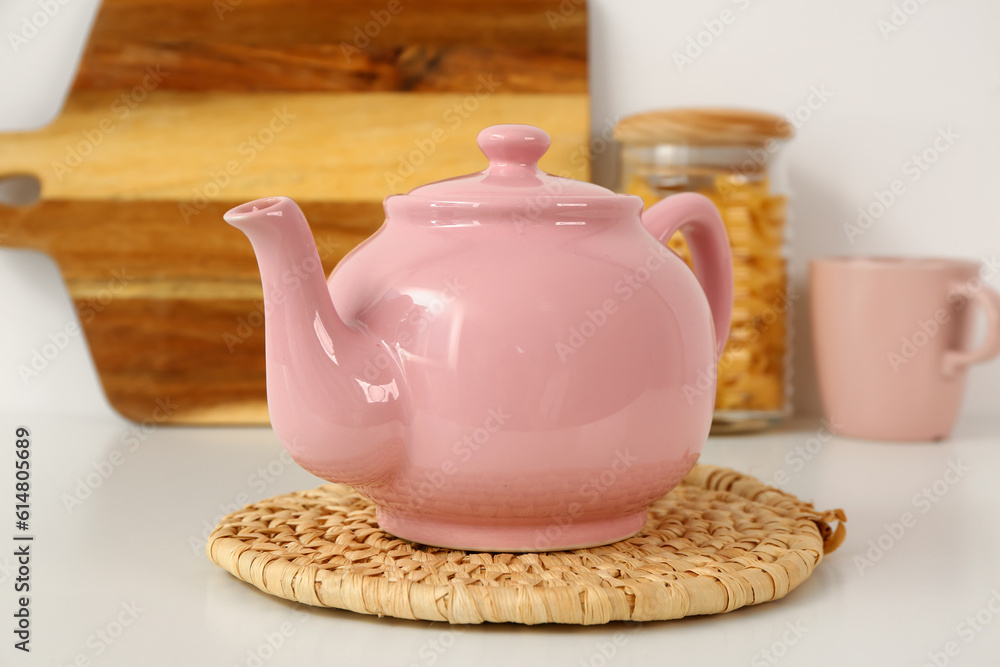 Composition with beautiful teapot and different items on white table