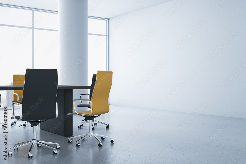 Modern concrete meeting room interior with blank mock up place on wall, colorful chairs, desk and pa
