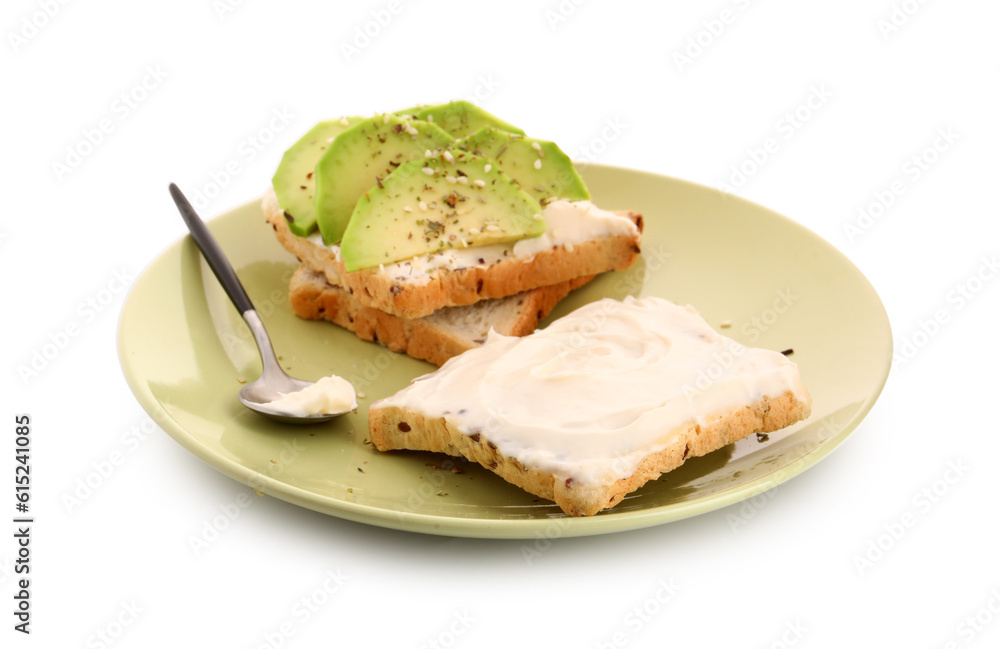 Plate of tasty toasts with cream cheese and avocado on white background