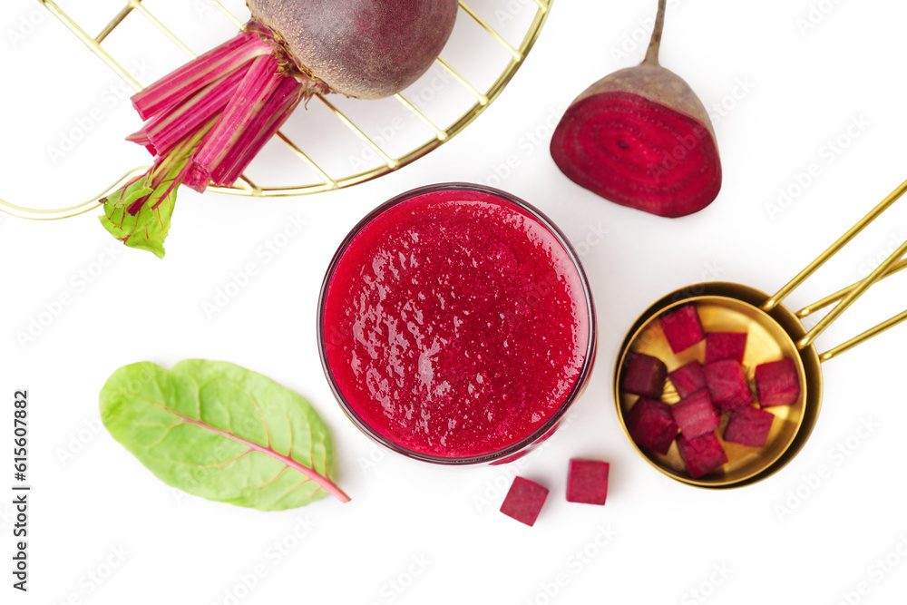 Glass of fresh beetroot juice on white background